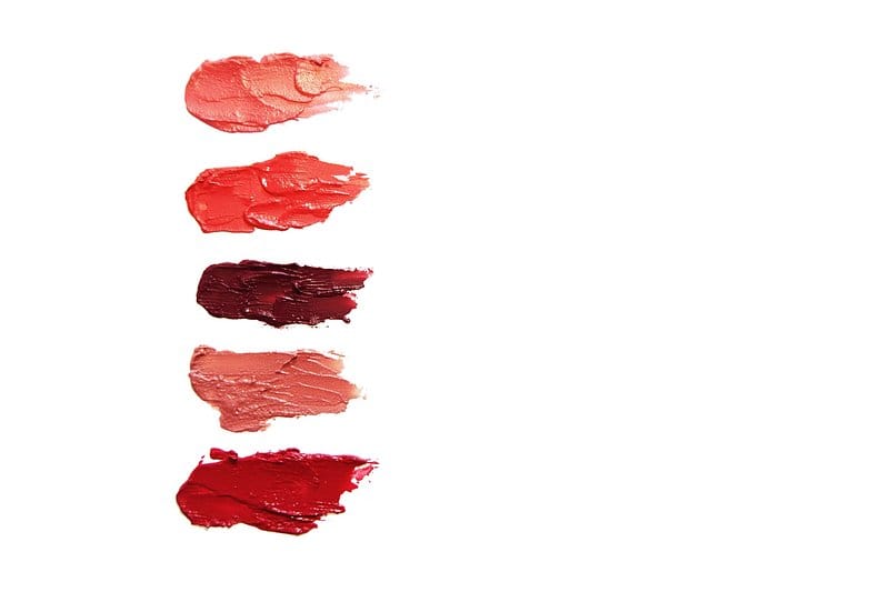 Colorful lip gloss and lipstick swatches